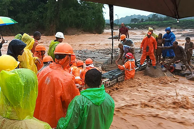 NDRF personnel conduct rescue operation after landslide - | Photo: PTI